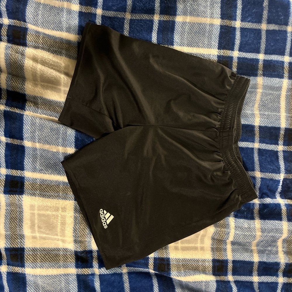 1 L pair of adidas shorts in the color black